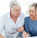 senior couple reviewing finances together
