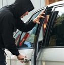 thief burglar at automobile car