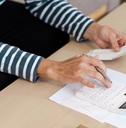 senior woman calculating budget at home