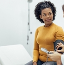 doctor measuring blood pressure