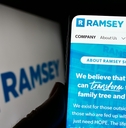 cellphone with webpage of ramsey solutions