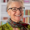 graceful senior woman smiling at library
