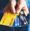 Woman showing credit cards