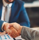 businessman shaking hand with client