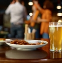 beer glass and fast food snack