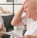 senior couple in debt