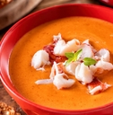 Creamy Lobster Bisque on wooden table