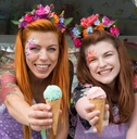 Two ladies holding ice cream from truck