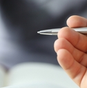 hands with pens