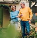 senior couple holding keys