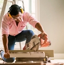 Contractor using sawing machine