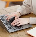 working on laptop