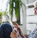 senior woman using digital tablet