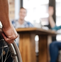 Handicapped man meeting his friends 