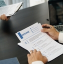 examiner reading a resume
