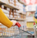 Customers doing grocery shopping at store