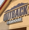 Outback Steakhouse sign on building