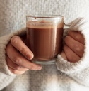 Woman hands holding hot chocolate 