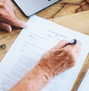 Senior signing a contract
