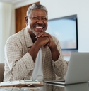  senior man working on laptop