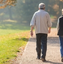 senior citizen couple taking a walk 