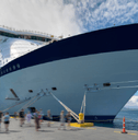 Large cruise ship with passengers disembarking
