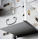 Bank deposit boxes with some open drawers