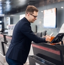 businessman in suit holding his passport