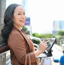 woman standing in a modern cityscape