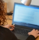 woman working on laptop from home