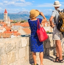 Couple taking picture of Trogir town