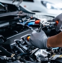 Mechanic doing maintenance on car