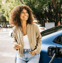 person leaning against car