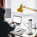 woman working on laptop at home