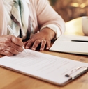  senior woman with application for retirement