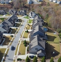 row of new developments houses in master