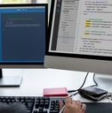 Female working on a desktop computer