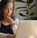 woman work at home using notebook computer