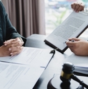 lawyer signing legal document