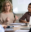 businesswoman with indian ethnic partner at meeting