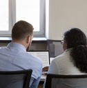 Mentor and intern editing text together