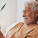 Older man using phone