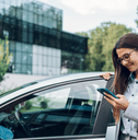 person standing by car