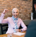 Happy senior woman after successful job interview