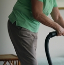 woman cleaning with vacuum 