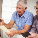 senior couple calculating bills