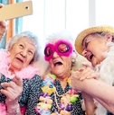 elderly people wearing funky costumes