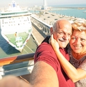 couple taking selfie on cruise ship