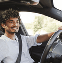 young driver at the wheel