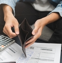 man opening an empty wallet